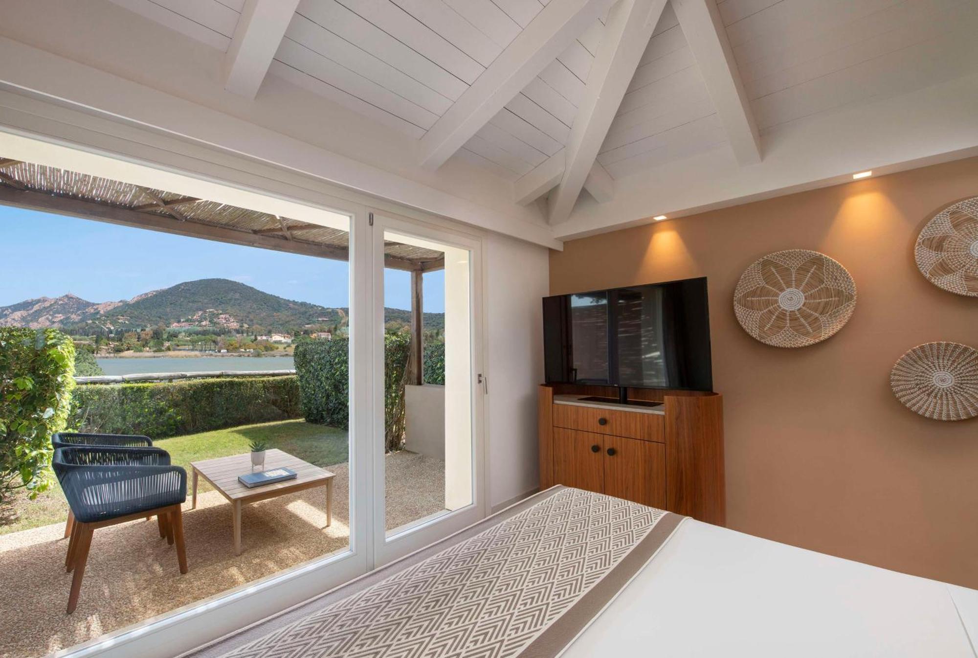 Baia Di Sardinia, Curio Collection By Hilton